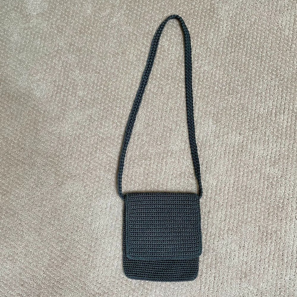 A Classic The Sak Gray Crocheted Shoulder Bag.